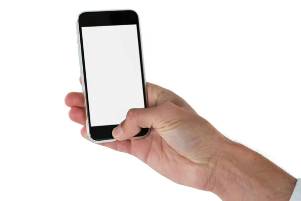Händer som håller en mobiltelefon mot vit bakgrund — Stockfoto