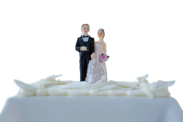 Wedding cake with couple figurines — Stock Photo, Image