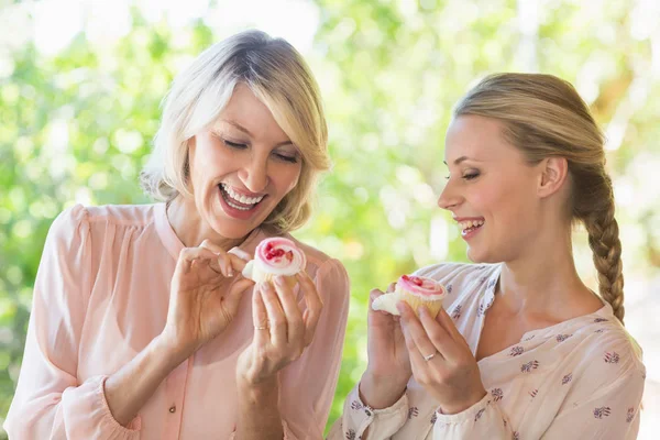 Friends using having sweet food at restaurant — Stock Photo, Image