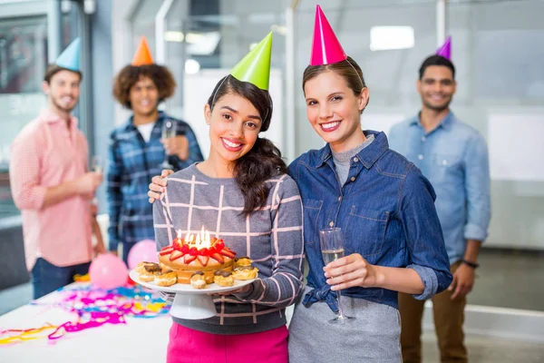 Happy executives celebrating their colleagues birthday — Stock Photo, Image