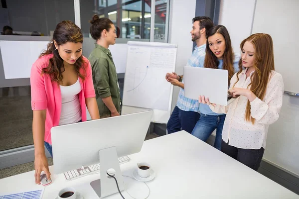 Attentive executives working in conference room — Stock Photo, Image