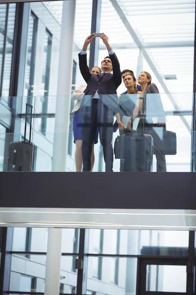 Business executives taking a selfie — Stock Photo, Image