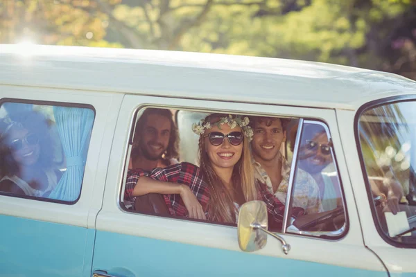 Group of friends travelling in campervan — Stock Photo, Image