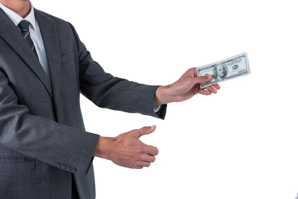 Sección media del hombre de negocios sosteniendo cien dólares — Foto de Stock