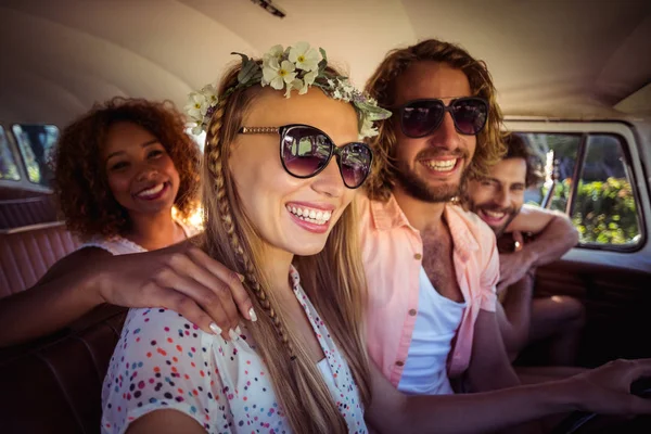 Group of friends travelling in campervan — Stock Photo, Image