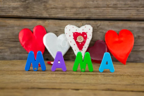 Σχήμα καρδιάς αλφάβητο ανάγνωση mama — Φωτογραφία Αρχείου