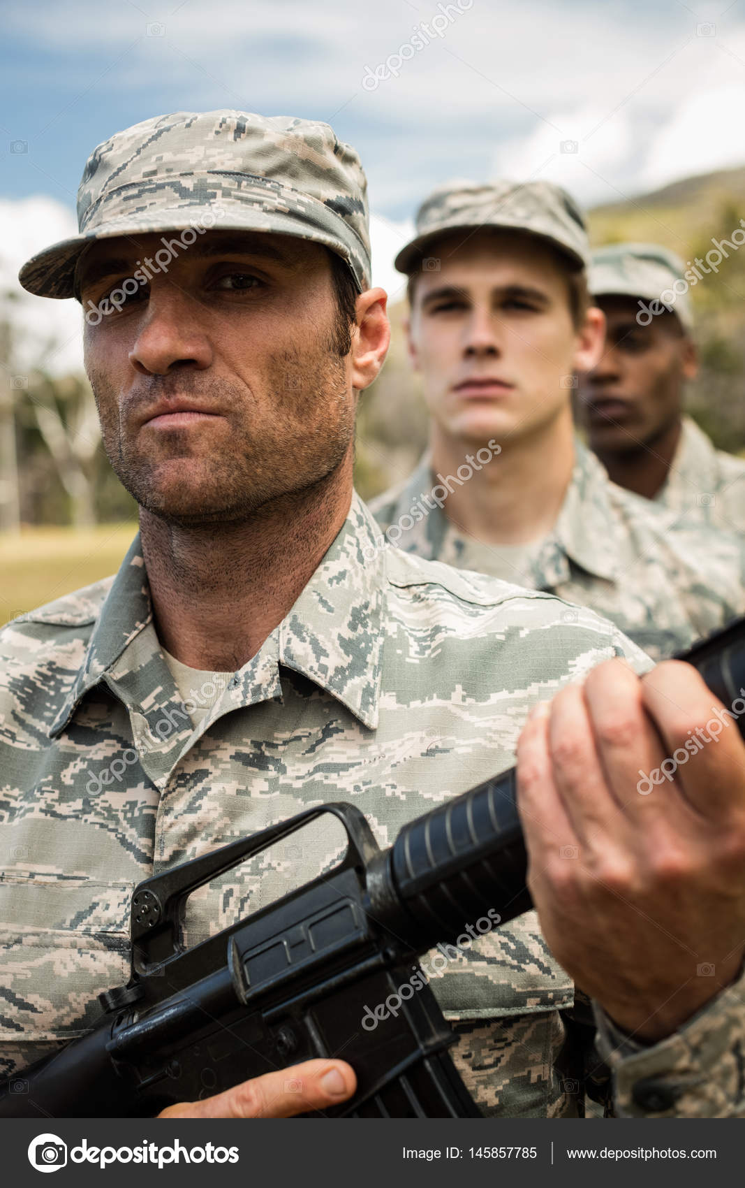 Group of military soldiers standing in line — Stock Photo