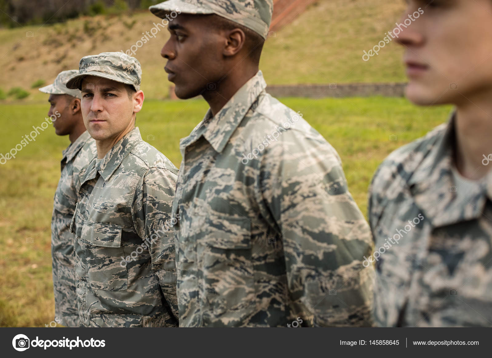 Group of military soldiers standing in line — Stock Photo