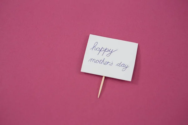 Tarjeta feliz día de la madre sobre fondo rosa —  Fotos de Stock