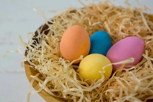 Colorful Easter eggs in the nest — Stock Photo, Image