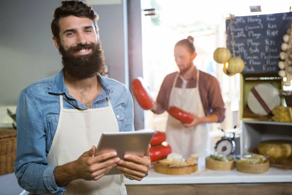 Portrait of smiling staff using digital tablet — Stock Photo, Image