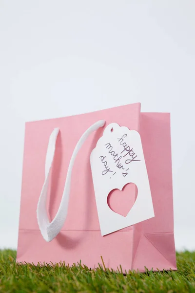 Happy mothers day card on paper bag — Stock Photo, Image