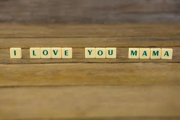 I love you mom block on wooden background — Stock Photo, Image