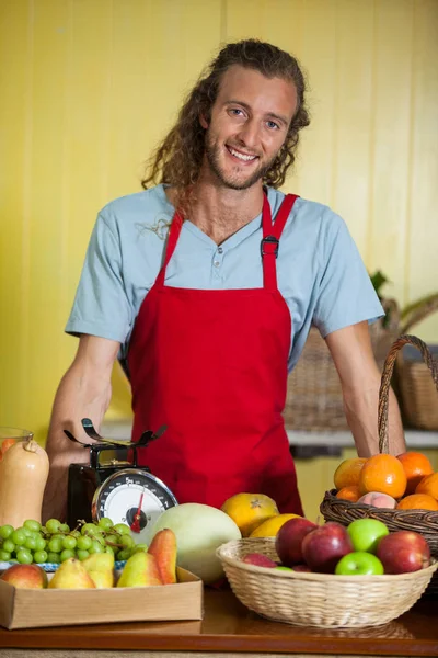 Portrait of smiling staff standing at counter — Stock Photo, Image