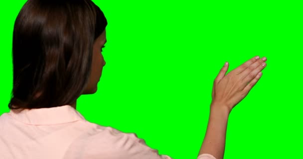 Woman pretending to touch digital screen — Stock Video