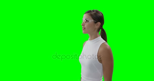 Businesswoman wearing futuristic eyewear while using digital screen — Stock Video