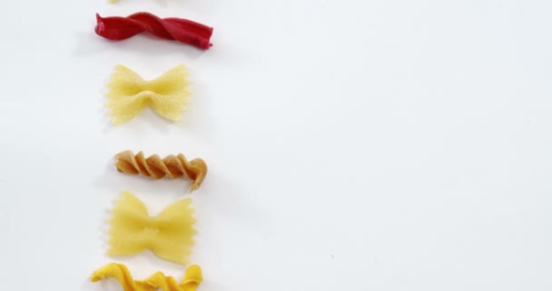 Various pasta arranged in a row — Stock Video