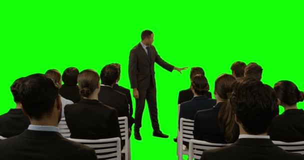 Businessman using futuristic digital screen while giving presentation to colleagues — Stock Video