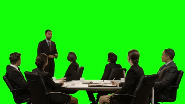 Team of business executives discussing over invisible screen — Stock Video