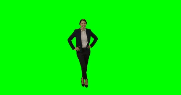 Portrait of smiling businesswoman standing with hands on hip — Stock Video