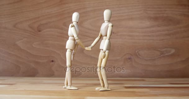 Figurine d'affaires serrant la main pendant la réunion — Video