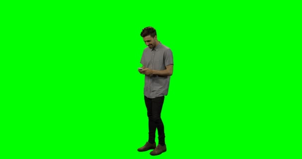 Young man using mobile phone — Stock Video