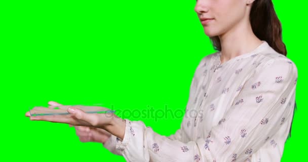 Woman pretending to hold digital tablet — Stock Video
