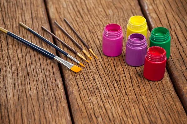 Paint brushes and watercolor paints — Stock Photo, Image