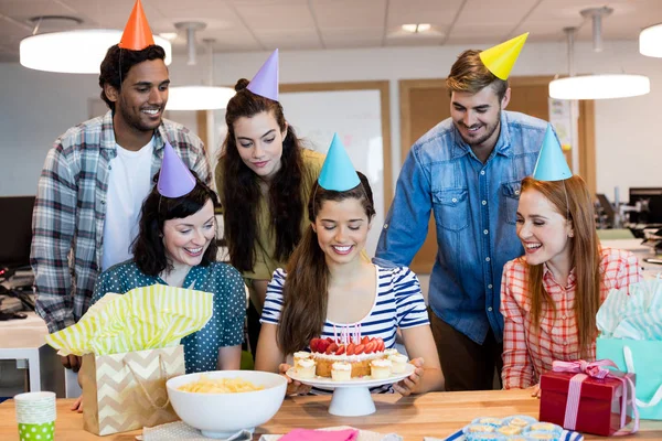 Creative business team celebrating colleagues birthday — Stock Photo, Image