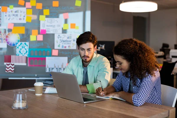 Creative business people working on desk — Stok Foto