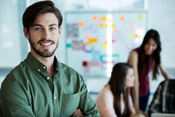Smiling man in office — Stock Photo, Image