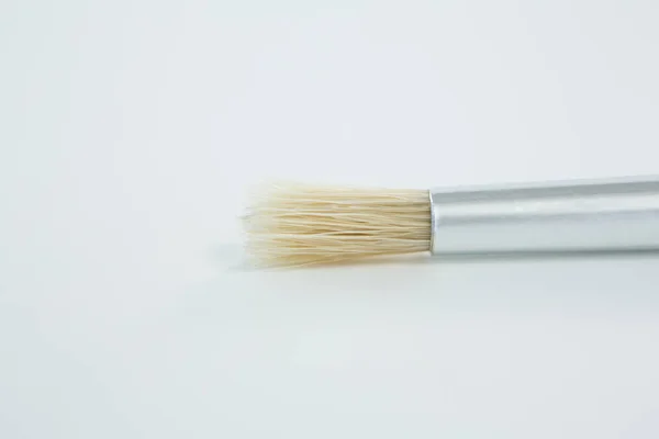 Flat paintbrush on white background — Stock Photo, Image