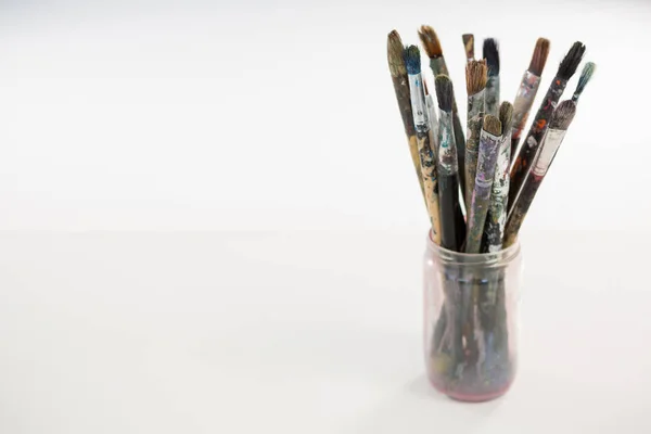 Various paintbrush in a jar — Stock Photo, Image