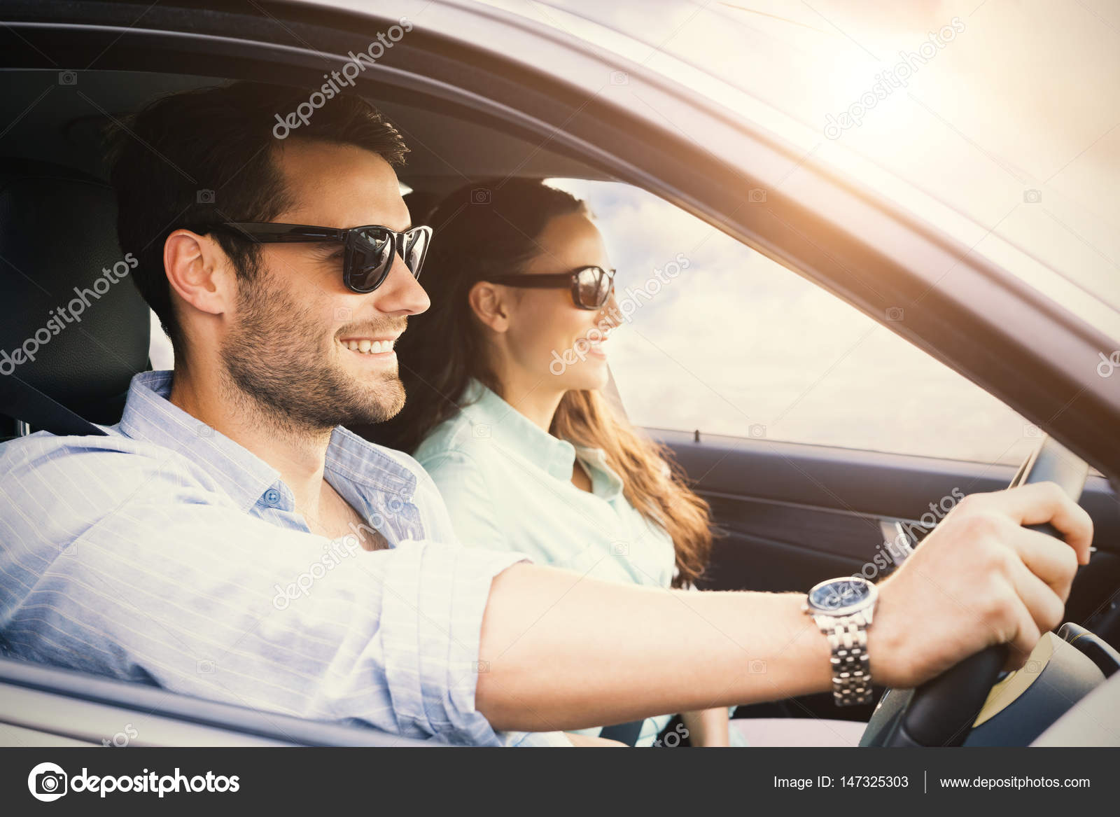 Couple sitting in car — Stock Photo © Wavebreakmedia #147325303
