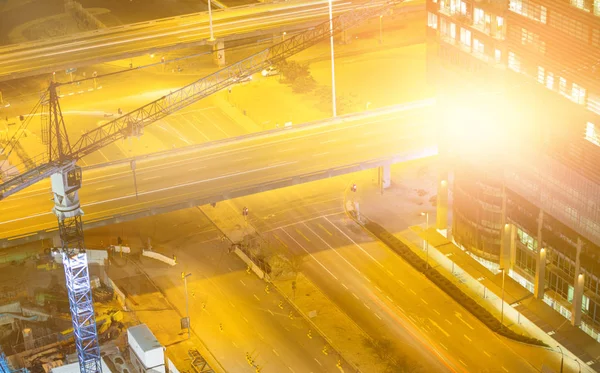 Paisaje urbano en polvo con luces iluminadas — Foto de Stock