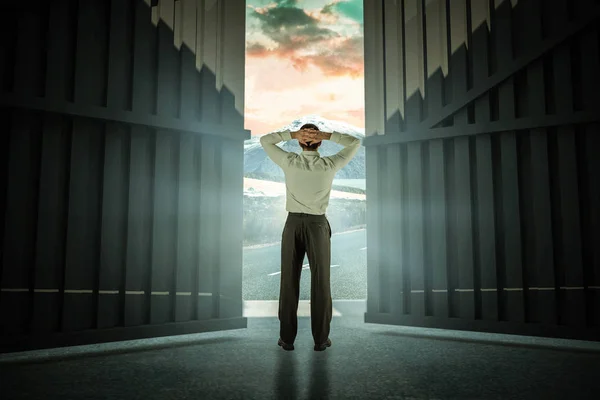 Businessman standing with hands on head — Stock Photo, Image