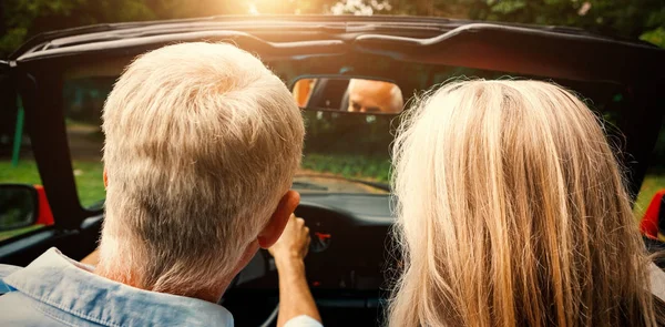 Mature couple going for ride — Stock Photo, Image