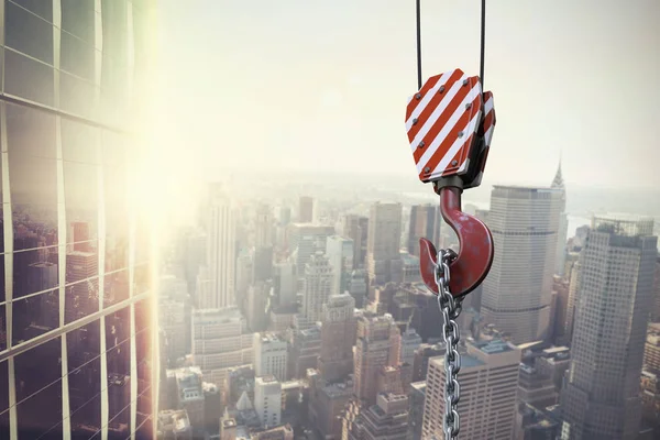 Composite image of studio shoot of a crane lifting hook — Stock Photo, Image