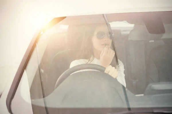 Woman driving car — Stock Photo, Image