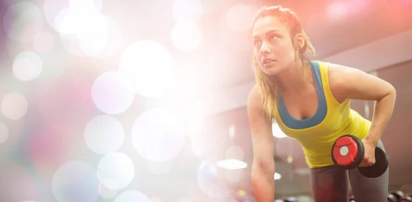 Woman doing workout with dumbbells — Stock Photo, Image