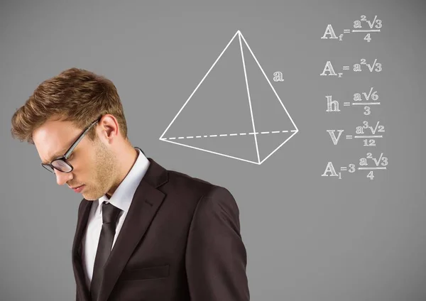 Бизнесмен с графикой рисования уравнений — стоковое фото