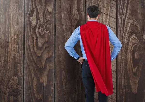 Superherói de negócios contra a madeira — Fotografia de Stock