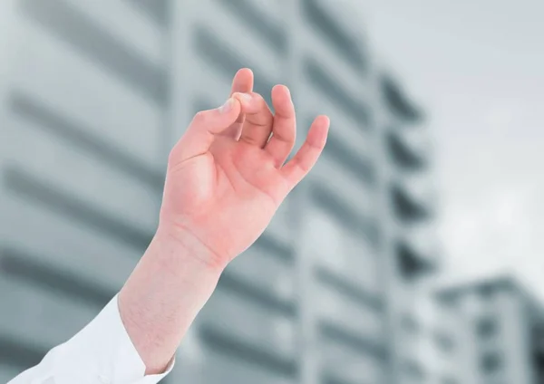 Hand Meditating by office building — Stock Photo, Image