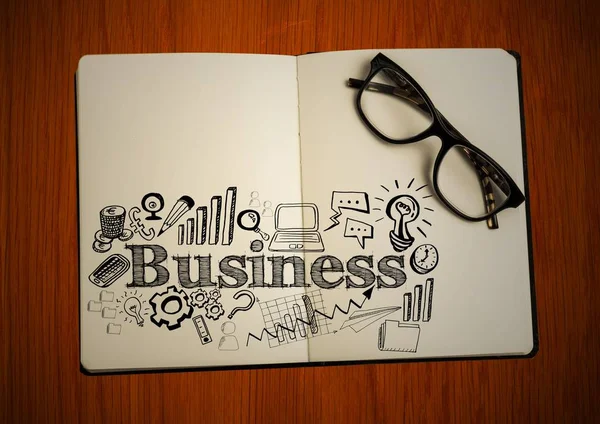 Nyitott könyv, szemüveg és fekete üzleti doodles tábla — Stock Fotó