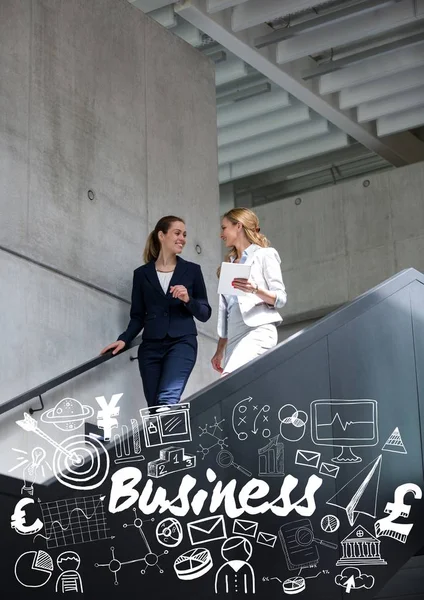 Dos mujeres de negocios en las escaleras con garabatos blancos — Foto de Stock
