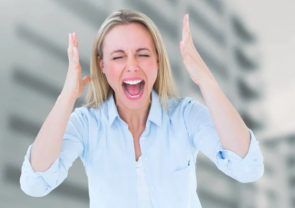 Stressed woman by officce buildings — Stock Photo, Image