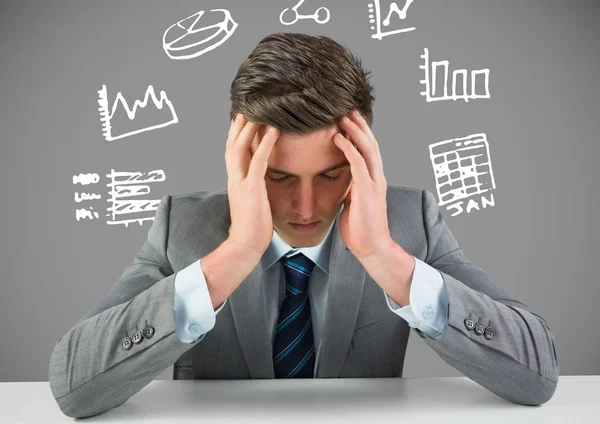 Businessman stressed with figures and charts drawings graphics — Stock Photo, Image