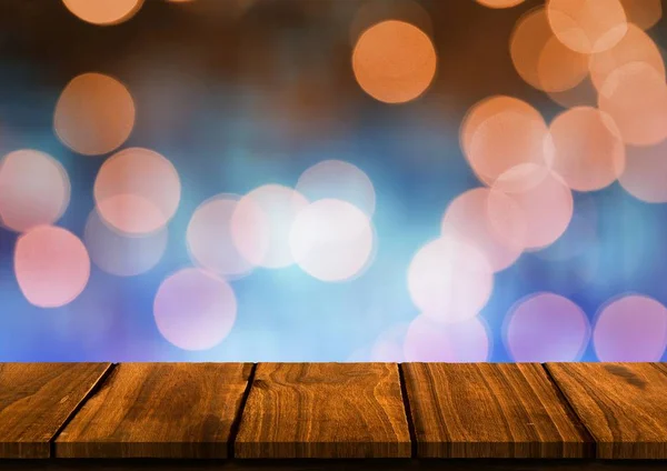 Mavi ve turuncu bokeh karşı masa — Stok fotoğraf