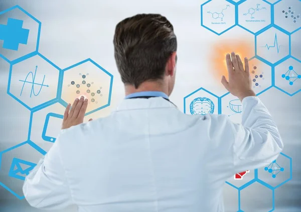 Back of man in lab coat touching blue medical interface — Stock Photo, Image