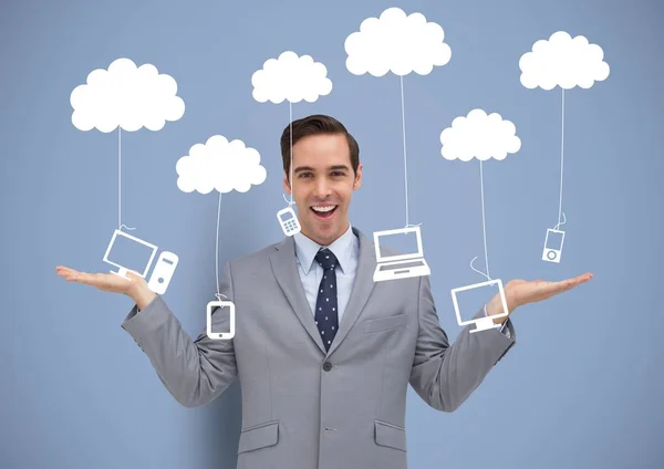 Man deciding or choosing computers phones and tablet devices hanging from clouds with open palms han — Stock Photo, Image